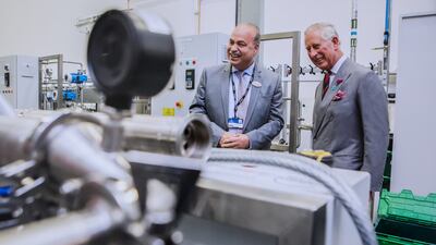 Prof Hilal with the UK's then Prince Charles at Swansea University, Wales, in 2017