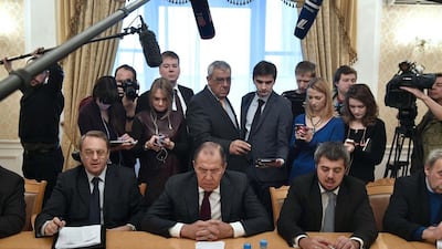 Russian Foreign Minister Sergei Lavrov (C) meets representatives of Syria's political opposition in Moscow on January 27, 2017. Alexander Nemenov / AFP