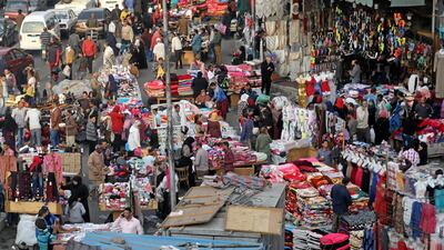 People shop at Al Ataba, a popular market in downtown Cairo, on December 12, 2017. Soaring prices have forced Egypt's middle class to adjust their spending habits. Mohamed Abd El Ghany / Reuters