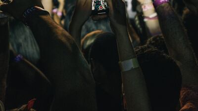 Experts advise to 'stop recording life, live it instead'. Unsplash