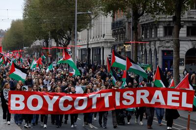 People protest in Dublin on Saturday calling for the Irish government to impose sanctions on Israel. Reuters