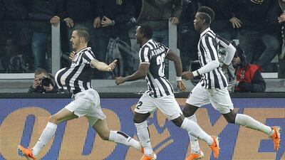 Leonardo Bonucci, left, celebrates after scoring for Juventus on Sunday. Marco Bertorello / Topshots / AFP