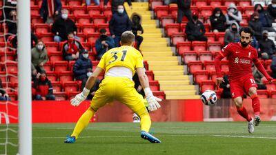 Liverpool's Mohamed Salah misses a chance in the first half. AP
