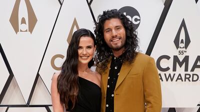 Dan Smyers, right, with partner Abby Smyers. AP Photo