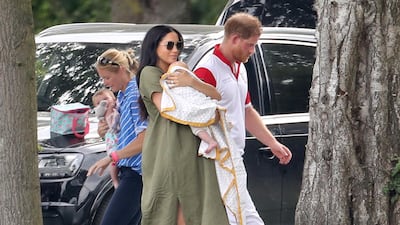 Prince Harry, Duke of Sussex, Meghan, Duchess of Sussex and Archie Harrison Mountbatten-Windsor attend The King Power Royal Charity Polo Day at Billingbear Polo Club on July 10, 2019. Getty Images