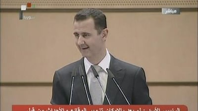 The Syrian president, Bashar Al Assad, delivers a speech at Damascus University on Tuesday.