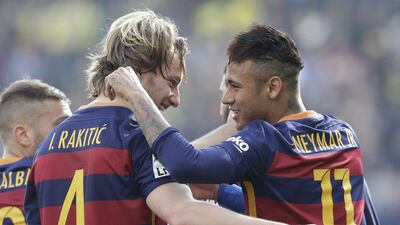 Barcelona’s Ivan Rakitic, left, and Neymar, right, celebrate together after Rakitic scored a goal against Villarreal during the Spanish La Liga match between Villarreal and Barcelona at the Madrigal stadium in Villarreal, Spain, Sunday, March 20, 2016. (AP Photo/Alberto Saiz)