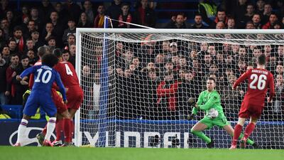Willian watches his shot go into the goal to score Chelsea's first goal against Liverpool in the FA Cup. AFP