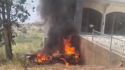 A vehicle burns after being hit by an Israeli drone in southern Lebanon. Photo: NNA