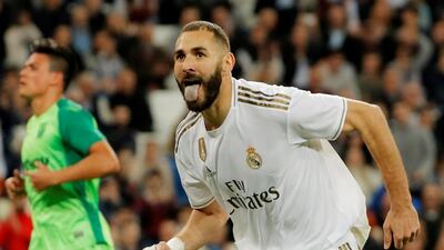 Real Madrid's Karim Benzema celebrates after scoring their fourth goal from the penalty spot. Reuters