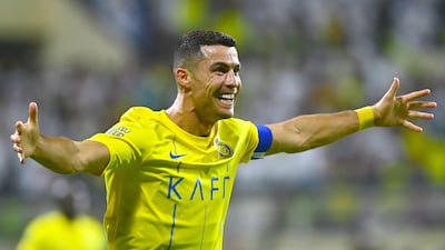 Nassr's Portuguese forward #07 Cristiano Ronaldo celebrates after scoring during the Saudi Pro League football match between Al-Nassr and Al-Fateh at the Prince Abdullah Bin Jalawi Stadium in al-Hasa, on August 25, 2023. (Photo by Ali Al-HAJI / AFP)