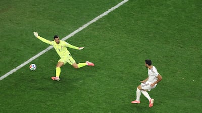 Spain's Mikel Merino shoots past Portugal goalkeeper Diogo Costa to make it 1-0. Getty Images