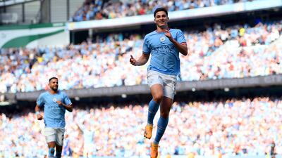 Julian Alvarez celebrates after scoring for Manchester City. Getty