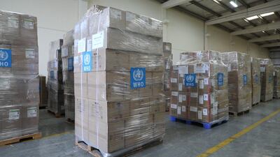 Boxes of masks, gloves, protective suits, tablet computers and other devices to monitor cases are made ready for the flight to Tehran on Monday. Andy Scott / The National