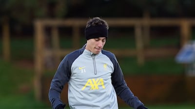 Liverpool's Konstantinos Tsimikas kicks the ball. PA