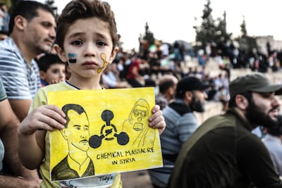 A demonstration in Idlib commemorating the victims of the 2013 chemical attack on Ghouta. Getty Images