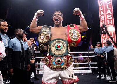 Anthony Joshua after reclaiming the IBF, WBA, WBO & IBO World Heavyweight Championship belts from Andy Ruiz (not pictured) at the Diriyah Arena, Diriyah, Saudi Arabia. PA Photo. Picture date: Saturday December 7, 2019. See PA story BOXING Saudi Arabia. Photo credit should read: Nick Potts/PA Wire