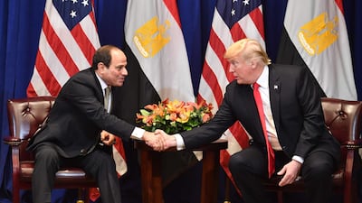 Egyptian President Abdel Fatah El Sisi and US President Donald Trump shake hands at a meeting in New York on September 24, 2018. AFP