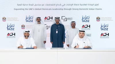 Dr Sultan Al Jaber, Minister of Industry and Advanced Technology and Adnoc managing director and group chief executive, with Hamad Al Ameri, managing director and group chief executive of Alpha Dhabi, Syed Shueb, managing director and chief executive of IHC, Mohamed Alrumaithi, chairman of Alpha Dhabi and Mashal Al-Kindi, Ta'ziz chief executive. Photo: Adnoc
