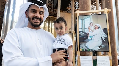 The Emirati Dads exhibition at the Swedish pavilion at Expo 2020 encourages shared parenting. Pictured is Emirati dad Abdul Rahman and his son Omar. Photos: Antonie Robertson / The National