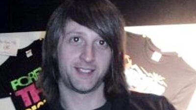 This undated family handout photo shows Nick Alexander of England, who was one of the victims of the attacks in Paris, who had been working at the Bataclan concert hall selling merchandise for the performing band. Foreign & Commonwealth Office via AP