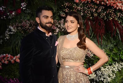 Virat Kohli and Anushka Sharma at their wedding reception in Mumbai on December 26, 2017. AFP