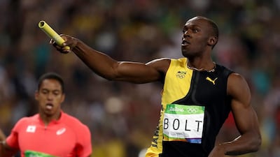 Usain Bolt of Jamaica crosses the finishline to win the Men's 4 x 100m Relay (Photo by Phil Walter/Getty Images)