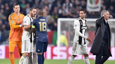 Manchester United manager Jose Mourinho confront Juventus players after the match. EPA