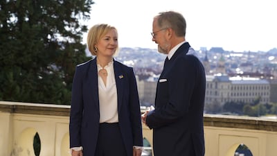 British Prime Minister Liz Truss is welcomed by Prime Minister of the Czech Republic Petr Fiala, in Prague. PA