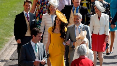 George Clooney and his wife Amal Clooney arrive for the wedding ceremony of Britain's Prince Harry and Meghan Markle at St George's Chapel, Windsor Castle, in Windsor. Odd Anderson / AFP