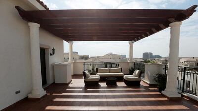Some of the villas come with a pleasant roof terrace. Christopher Pike / The National