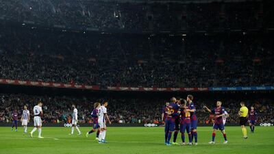 Barcelona players celebrate after Lionel Messi scores their fourth goal Reuters/Albert Gea