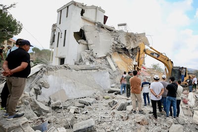 Rubble is cleared from the site of an Israeli strike on Arab Salim, in southern Lebanon. EPA