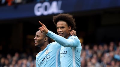 Raheem Sterling, left, and Leroy Sane have proved more successful than Manchester City's traditional strikers. Nick Potts / AP Photo