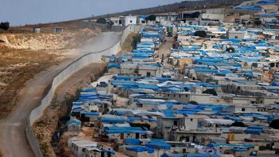 The border wall between Turkey and Atimah town in Idlib, Syria / Osman Orsal