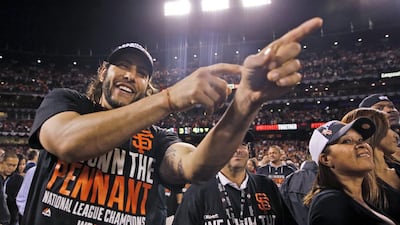 San Francisco Giants left fielder Michael Morse celebrates after their win against the St. Louis Cardinals in Game 5 of the National League baseball championship series Thursday, Oct. 16, 2014, in San Francisco. AP Photo/Jeff Roberson