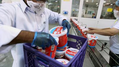 The Al Ain Dairy factory, owned by Agthia, produces the Yoplait yoghurt brand. Delores Johnson / The National