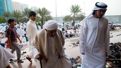 People arrive for Eid prayers at Musaab Bin Omair Mosque in Abu Dhabi. Christopher Pike / The National