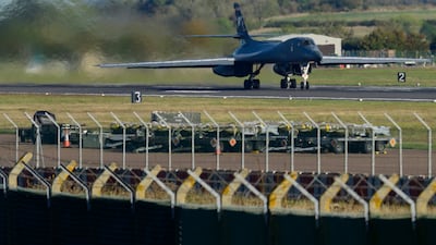 Munitions beside a runway as a B-1 Lancer heavy bomber leaves British airbase RAF Fairford. Getty Images