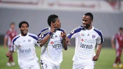Asamoah Gyan, centre, has had plenty of success in his first season at Al Ain.