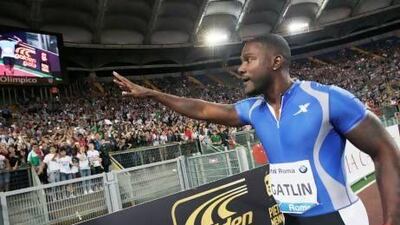 American sprinter Justin Gatlin celebrates after beating Jamaica’s Usain Bolt and winning the men’s 100m event at the Golden Gala IAAF track meet in Rome on Thursday. Andrew Medichini / AP Photo