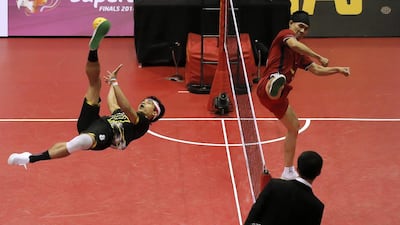 Thailand’s Anuwat Chaichana (R) and Malaysia’s Khairol Zaman in action during their mens final match. Asia Sports Ventures / Action Images via Reuters