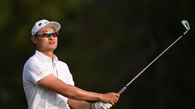 Haotong Li tees off on the fourth hole during round one of the Dubai Desert Classic at Emirates Golf Club on Thursday, January 18, 2024. Getty Images