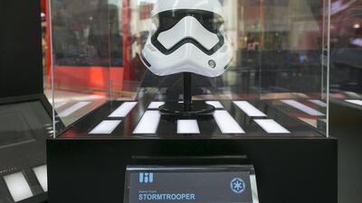 A Stromtrooper helmet on display ahead of the Star Wars UAE premiere on December 17 in Yas Mall. Mona Al Marzooqi / The National