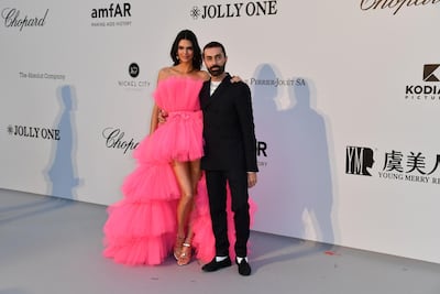 Kendall Jenner and Giambattista Valli at the debut of his collection for H&M at Cannes. Reuters