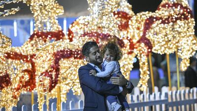 Father and daughter at the Winter Wonderland event at the Maryah Island waterfront promenade. All photos by Khushnum Bhandari for The National
