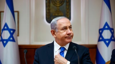 (FILES) In this file photo taken on June 30, 2019, Israeli Prime Minister Benjamin Netanyahu chairs the weekly cabinet meeting at his office in Jerusalem. Netanyahu is set to surpass founding father David Ben-Gurion as Israel's longest-serving prime minister, having notched up a list of diplomatic and economic successes but with right-wing leadership many see as deeply divisive. The 69-year-old Netanyahu on July 20 will have served as Israel's prime minister for a total of 4,876 days -- over 13 years, according to a calculation by the Israel Democracy Institute think tank. / AFP / POOL / Oded Balilty