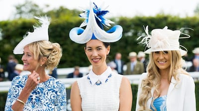 Ladies take part in the Best Dressed Ladies competition sponsored by L’Ormarins at Glorious Goodwood at Goodwood on August 1, 2014 in Chichester, England. Samir Hussein / Getty Images for Goodwood