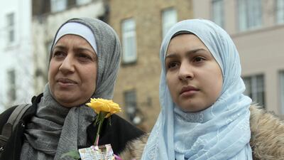 Chama Bouanik and her daughter Aisha (14) attend the Stop Racism demonstration in north London on 'Punish a Muslim Day' April 4th. The National / Stephen Lock