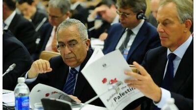 Palestinian prime minister Salam Fayyad (left) looks at Middle East Quartet envoy Tony Blair during a meeting at the United Nations headquarters in New York last month. AFP PHOTO / Emmanuel Dunand